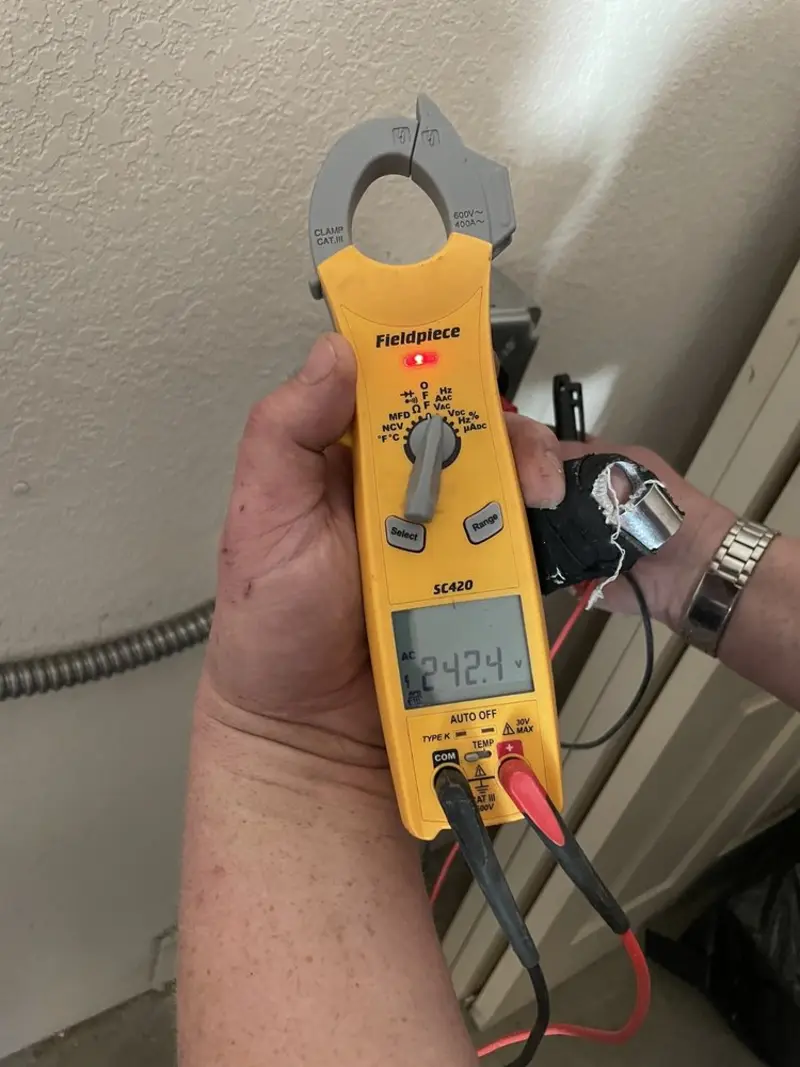 Voltage testing with clamp meter during Generator Installation in Grantham